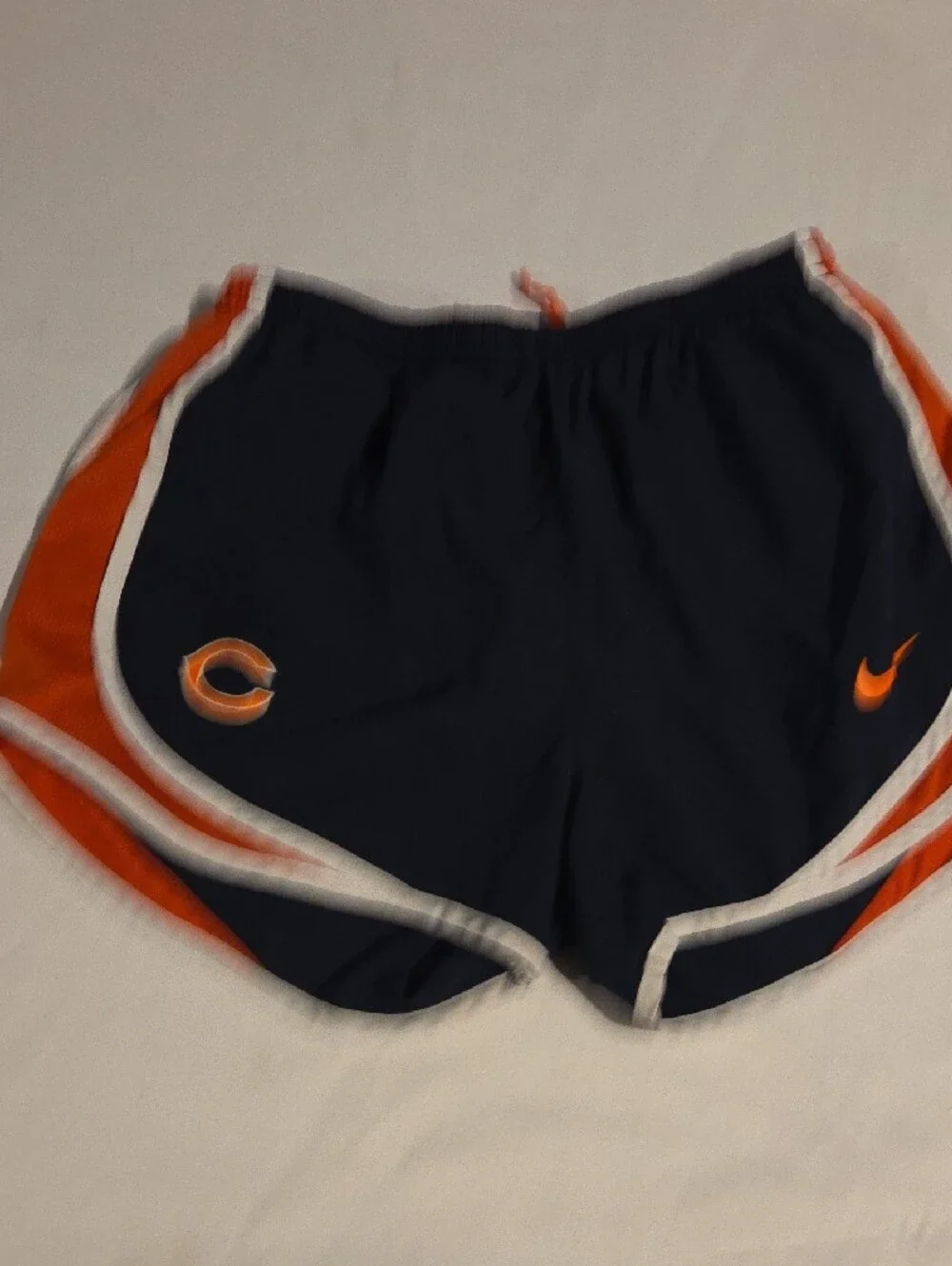 Nike Women’s Navy Athletic Shorts with Orange and White Trim